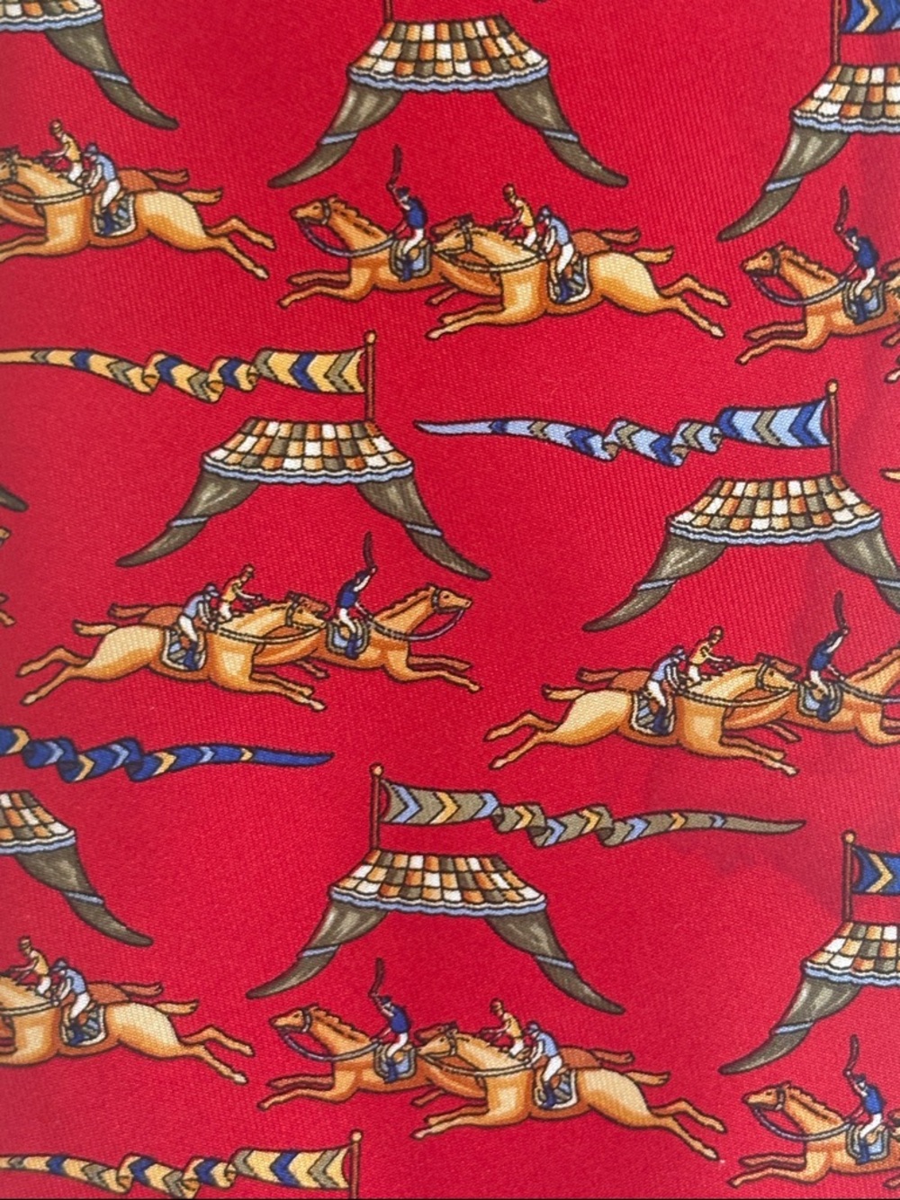 Salvatore Ferragamo 100% silk necktie featuring an equestrian print